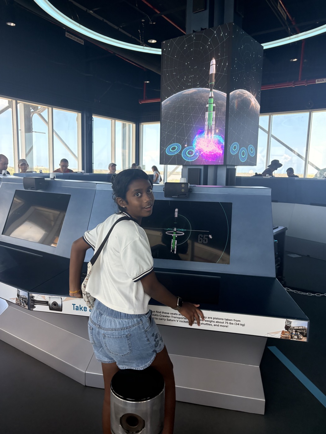 Tanya at the Creating a Rocket interactive exhibit, Kennedy Space Center